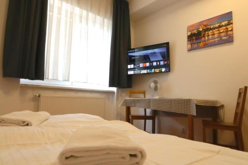 Letto o letti in una camera di University Hotel