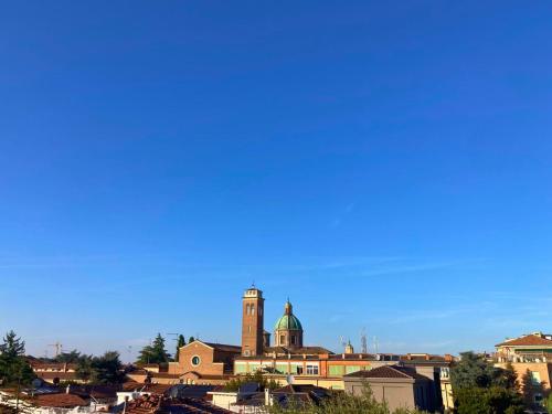 a city with a clock tower in the background at Vista Duomo Ravenna City Center Apartment in Ravenna