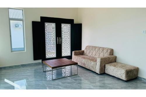 Гостиная зона в Capital O 91227 Chalet D'bendang Mak Teh