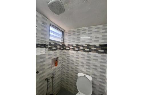Ванная комната в Capital O 91227 Chalet D'bendang Mak Teh