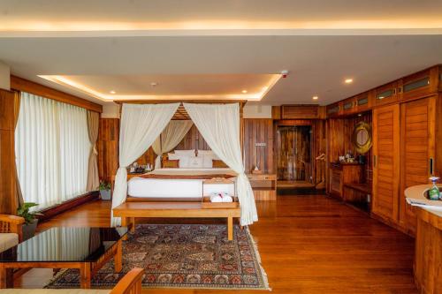 a bedroom with a bed in a room at Chandys Drizzle Drops - Munnar Top Station in Munnar