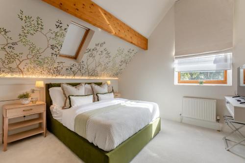 a bedroom with a large bed and a desk at 6 Bed in Ainsdale oc-w33455 in Ainsdale