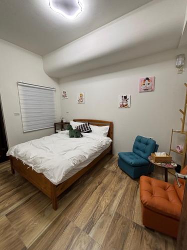 Postel nebo postele na pokoji v ubytování Xunfeng B&B