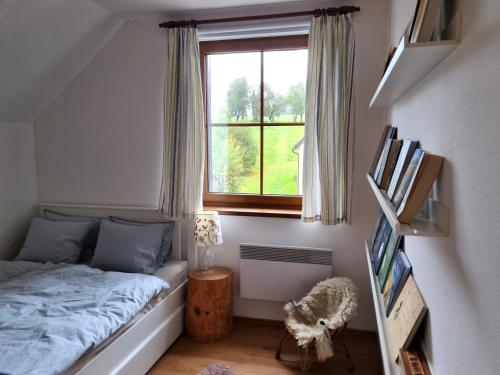 Postel nebo postele na pokoji v ubytování Apartmán Hrabětice