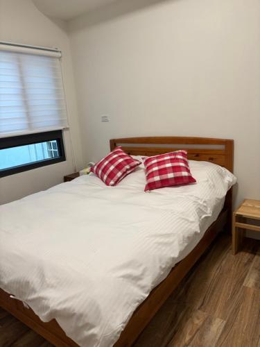 Postel nebo postele na pokoji v ubytování Xunfeng B&B