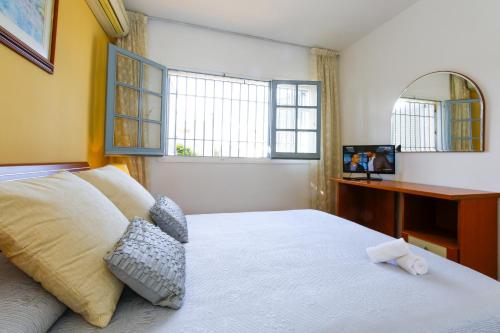 Postel nebo postele na pokoji v ubytování Casa QUEVEDO