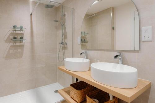 a bathroom with a white sink and a shower at 4 Bed in Lobb oc-s33517 in Georgeham