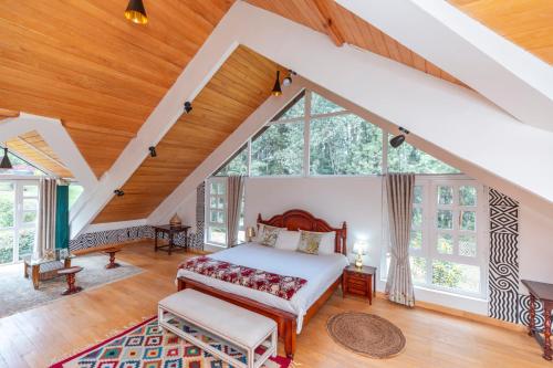 Postel nebo postele na pokoji v ubytování Chez Drocella Eglantine Lodge