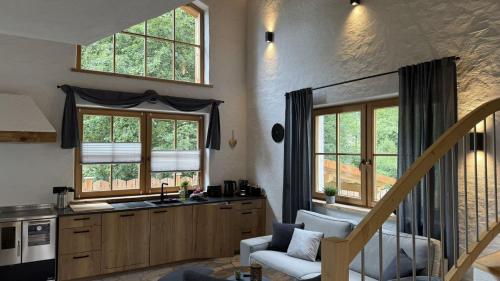 Kuchyň nebo kuchyňský kout v ubytování Chalet am Bachl 1