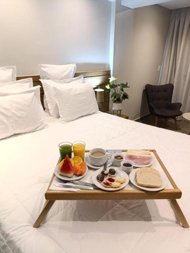 Cama ou camas em um quarto em Hotel Le Pelican