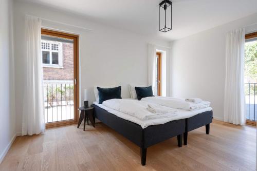 Postel nebo postele na pokoji v ubytování Luxury Apartment Close to Amalienborg Stylish Stay for Five