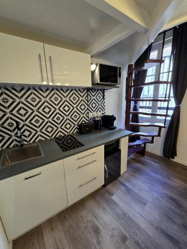Una cocina o zona de cocina en Escale