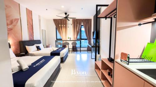 Letto o letti in una camera di Paxtonz Premium Suites Petaling Jaya