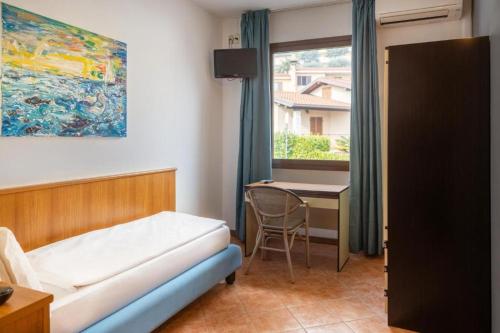 Postel nebo postele na pokoji v ubytování Aria Life Hotel