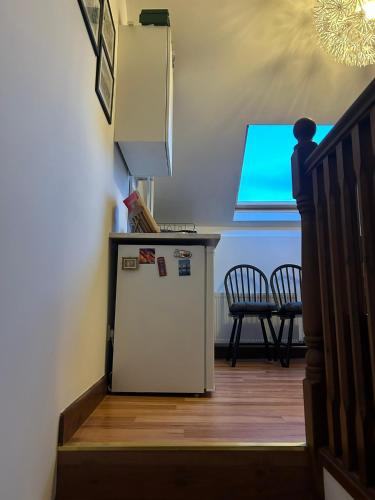 Kuchyň nebo kuchyňský kout v ubytování Apartment - Clonlyne House