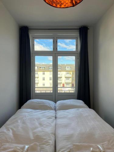 Ένα ή περισσότερα κρεβάτια σε δωμάτιο στο Charming Hellerup Residence