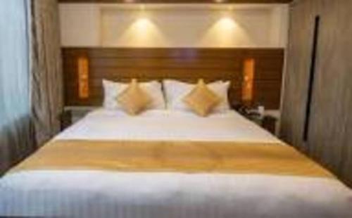 Cama o camas de una habitación en Hotel X Rajshahi