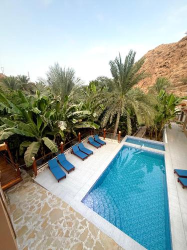 Πισίνα στο ή κοντά στο Nomad inn Tiwi