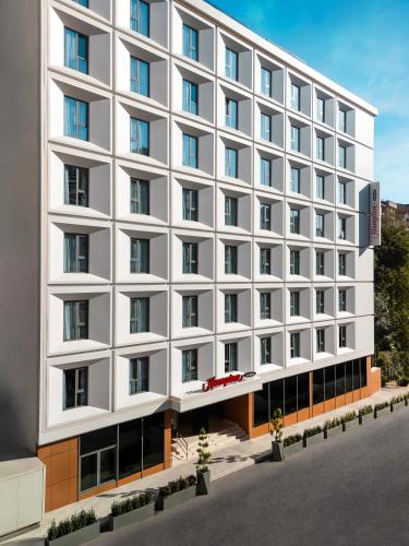 an architectural rendering of a hotel building at Hampton By Hilton Istanbul Sisli in Istanbul