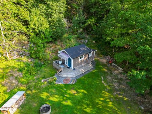 an aerial view of a tiny house in the grass at Knaggelid Guest Houses in Svängsta