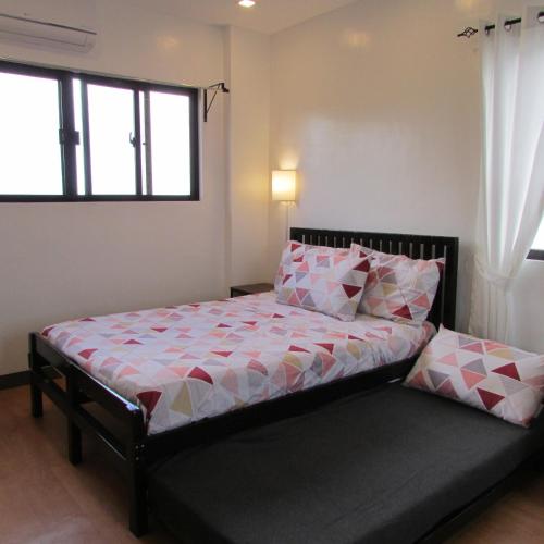 Postel nebo postele na pokoji v ubytování Casa Devino - Discover the Perfect Condo Getaway in Luxury, Karaoke, Netflix, Free Parking