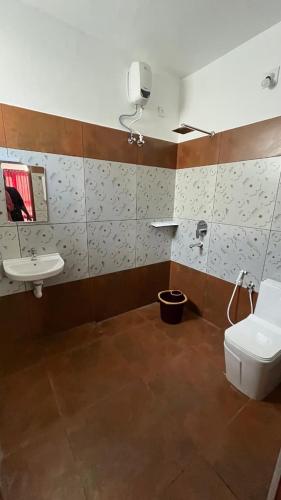 Koupelna v ubytování Hotel Paradise Kovalam
