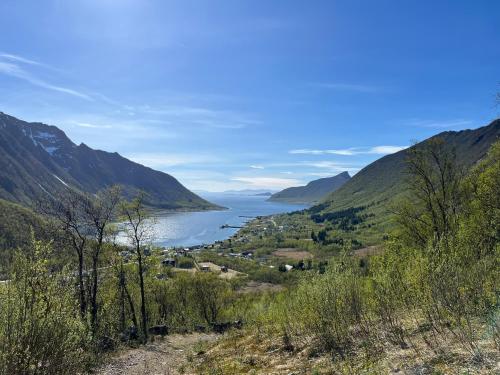 a view of a lake from a mountain at Fantastic house with seafront property in Gryllefjord in Gryllefjord