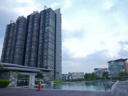 a group of tall buildings in a city at The Cyberjaya Hideout - Hive Studio in Cyberjaya