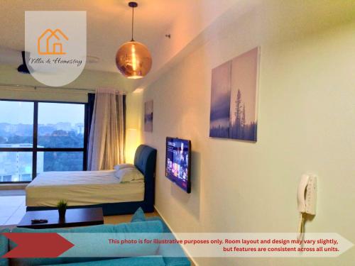 a bedroom with a bed and a tv on a wall at The Cyberjaya Hideout - Hive Studio in Cyberjaya