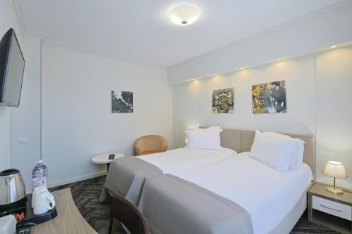 Cama o camas de una habitación en Potaissa Hotel
