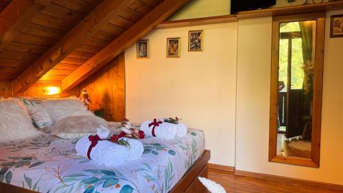 Postel nebo postele na pokoji v ubytování Chalet Stravedo by Ca-Sa Check