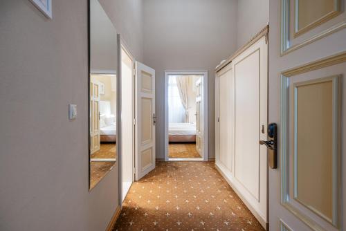 Postel nebo postele na pokoji v ubytování Hotel Gino Park Palace - Kaštieľ Orlové