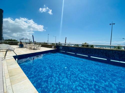 Kolam renang di atau dekat dengan Apartamento de frente para o mar de Caiobá