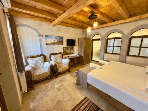 Cama o camas de una habitación en Cappadocia Caves Hotel