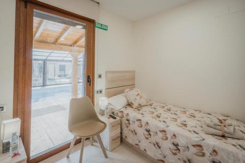 Postel nebo postele na pokoji v ubytování La Costana De Barbadillo