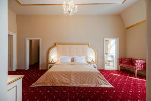 Postel nebo postele na pokoji v ubytování Hotel Gino Park Palace - Kaštieľ Orlové