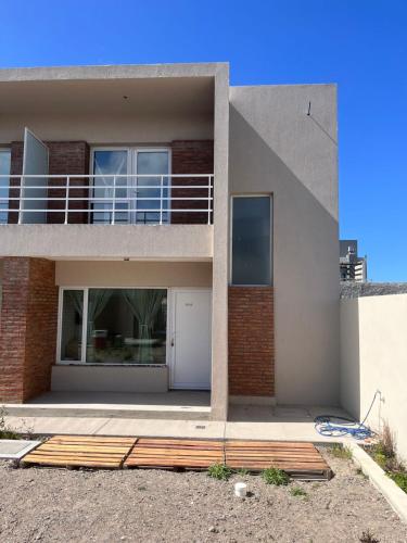 a rendering of a house with a balcony at Santa Lucía in Playa Unión
