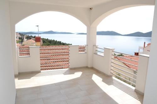 a view of the water from the balcony of a house at House with Sea View in Drage