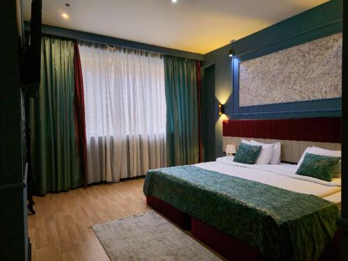 Postel nebo postele na pokoji v ubytování Pilot By Haz Hotel