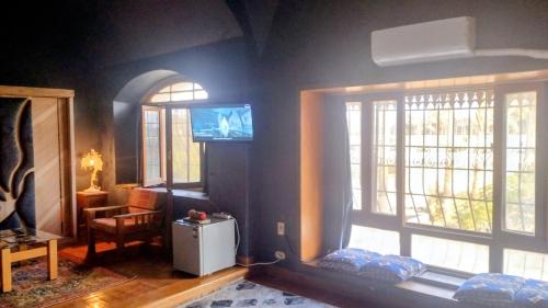TV/trung tâm giải trí tại Alf Layla Resort