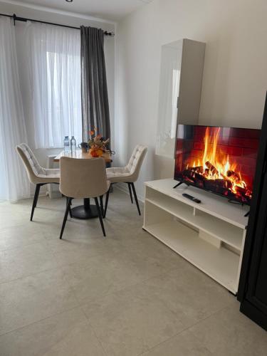TV a/nebo společenská místnost v ubytování Hotel Sharlota