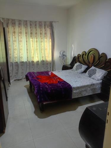 Ένα ή περισσότερα κρεβάτια σε δωμάτιο στο Al Martini Building Number 11