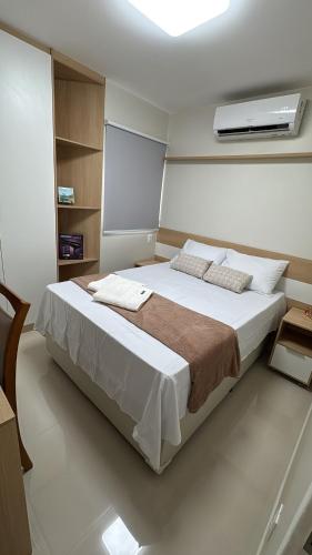 En eller flere senge i et værelse på Seu lar no melhor de Recife 4