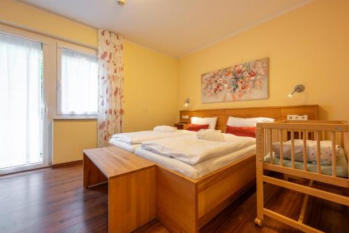 Postel nebo postele na pokoji v ubytování Familotel Mein Krug
