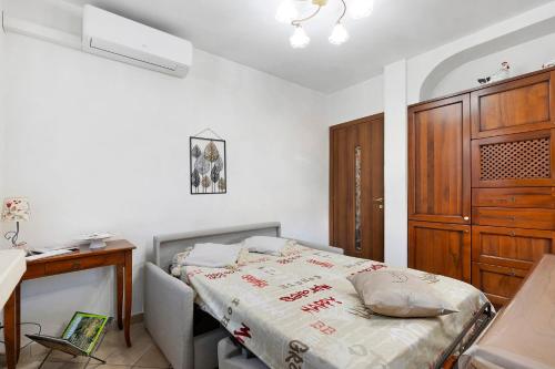 Кровать или кровати в номере La dimora nel Roero con Patio