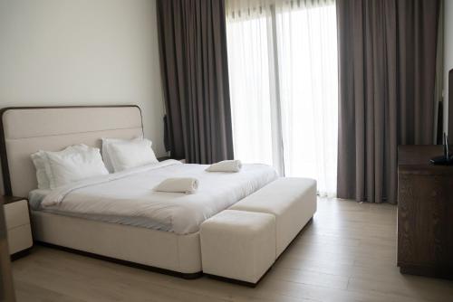 Cama o camas de una habitación en Luxury Villas with Beach Access by VB Homes