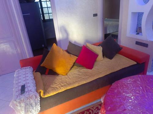 Postel nebo postele na pokoji v ubytování appartement à al tilal