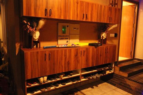 a cabinet filled with lots of wine bottles at Zianas's Den in Bengaluru