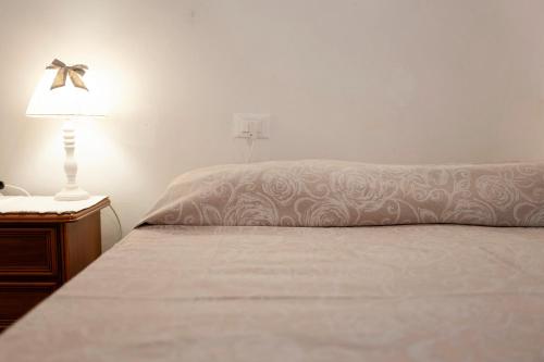 Кровать или кровати в номере Casa Reanna