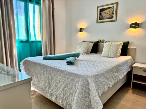 Postel nebo postele na pokoji v ubytování Holiday Bungalow Costa Calma